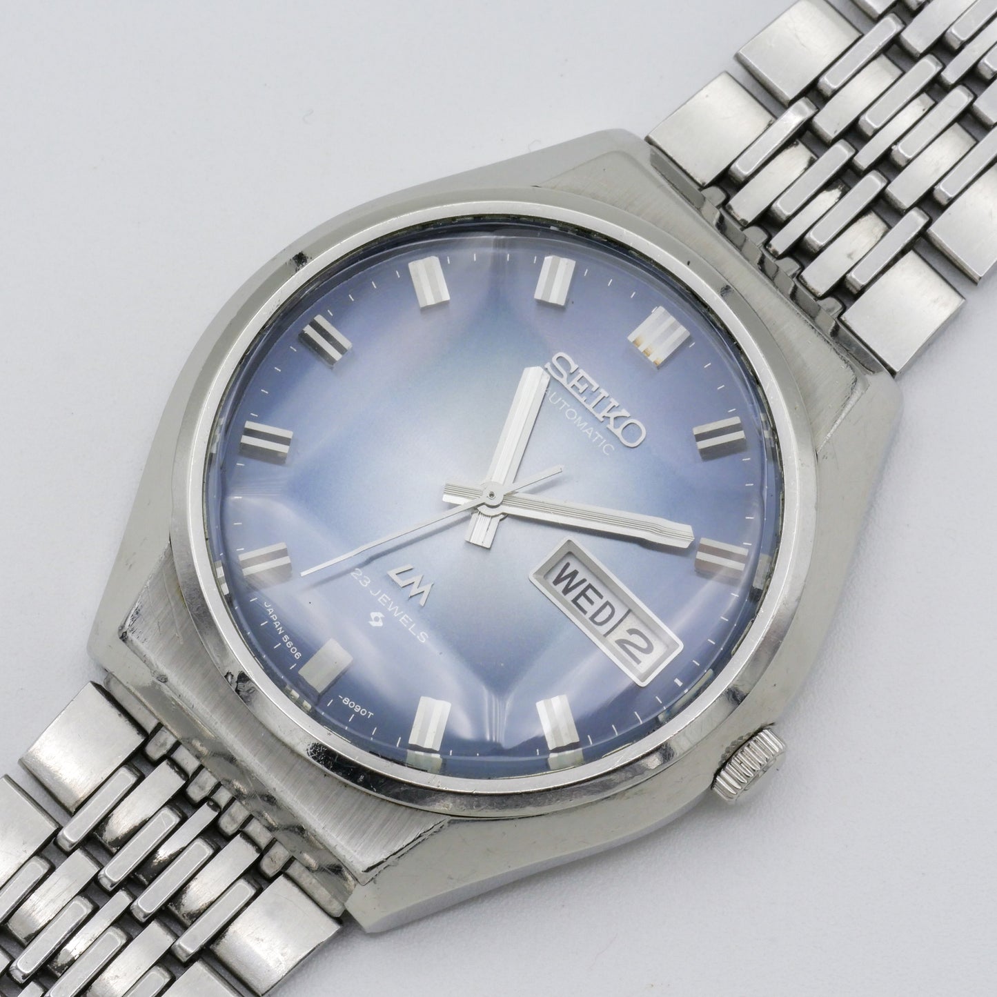 SEIKO LORD MATIC LM DAY-DATE FACETED CRYSTAL BLUE DIAL AUTOMATIC REF. 5606-8061