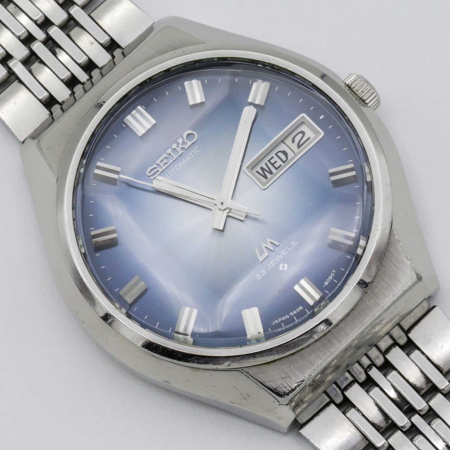 SEIKO LORD MATIC LM DAY-DATE FACETED CRYSTAL BLUE DIAL AUTOMATIC REF. 5606-8061