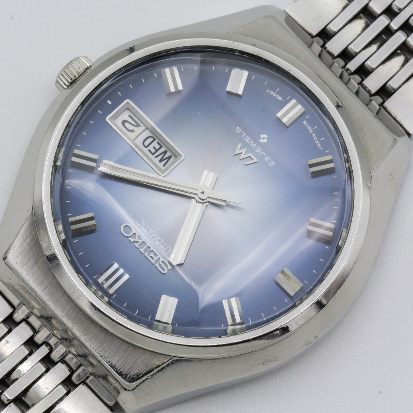 SEIKO LORD MATIC LM DAY-DATE FACETED CRYSTAL BLUE DIAL AUTOMATIC REF. 5606-8061