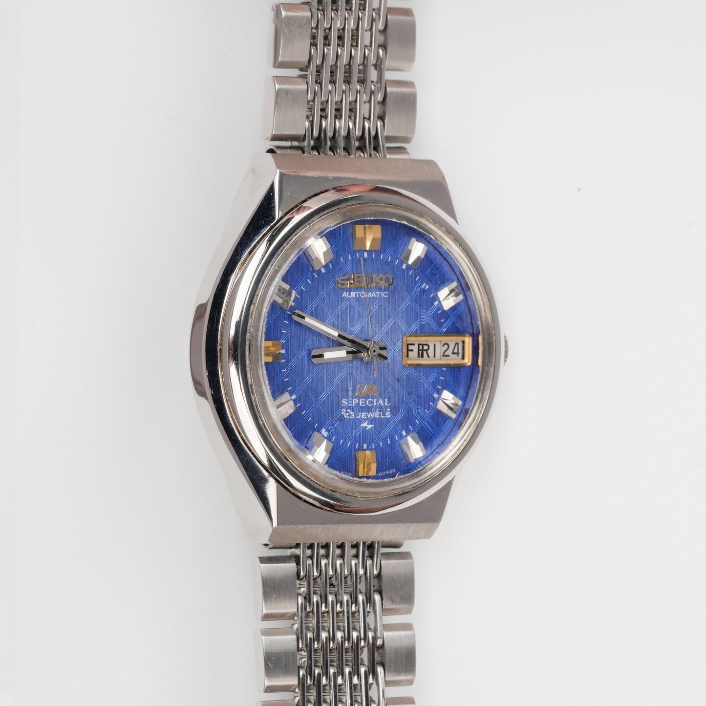 SEIKO LM SPECIAL DAY-DATE AUTOMATIC FACETED CRYSTAL BLUE DIAL REF. 5216-8130