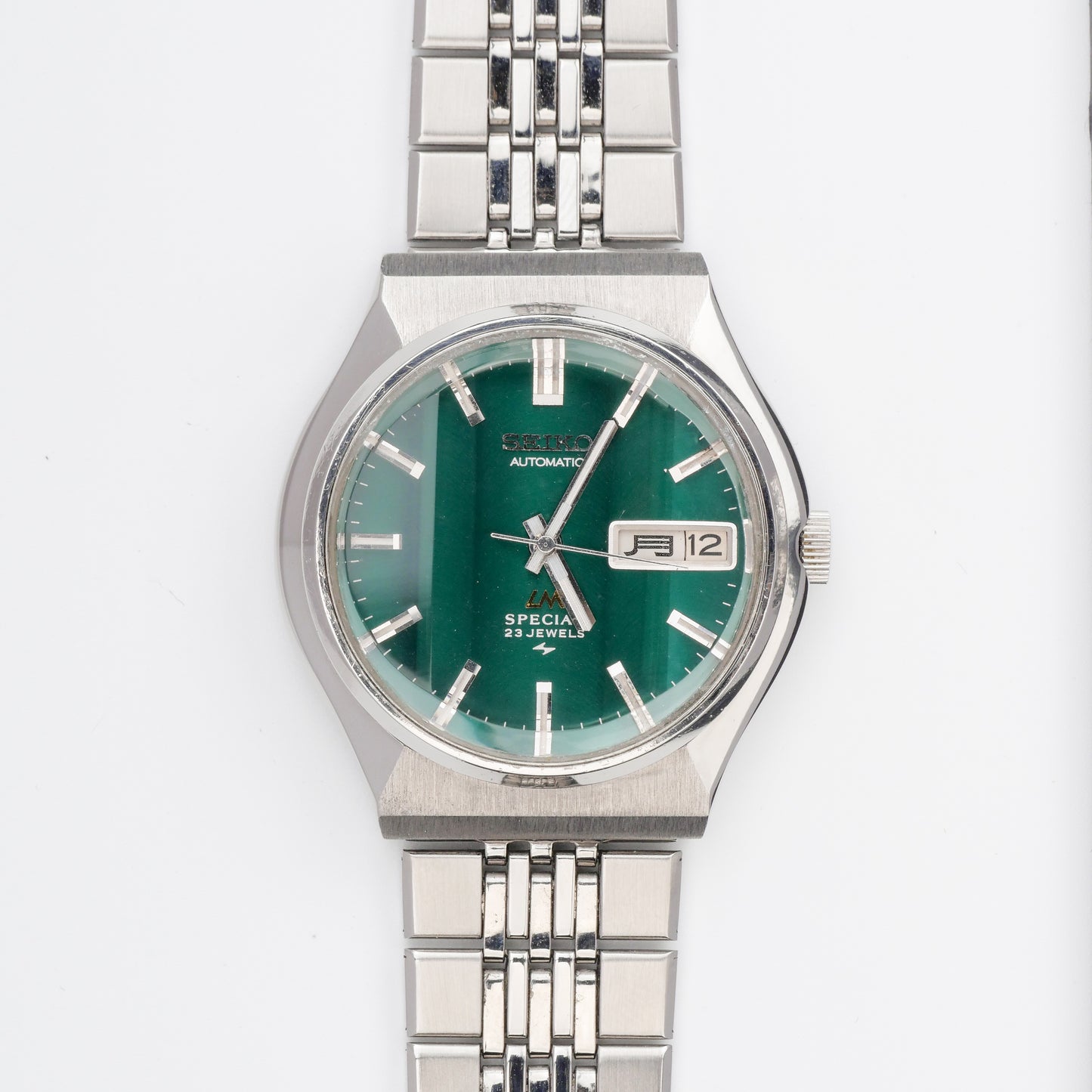 SEIKO LM SPECIAL DAY-DATE AUTOMATIC FACETED CRYSTAL GREEN DIAL REF. 5216-7040