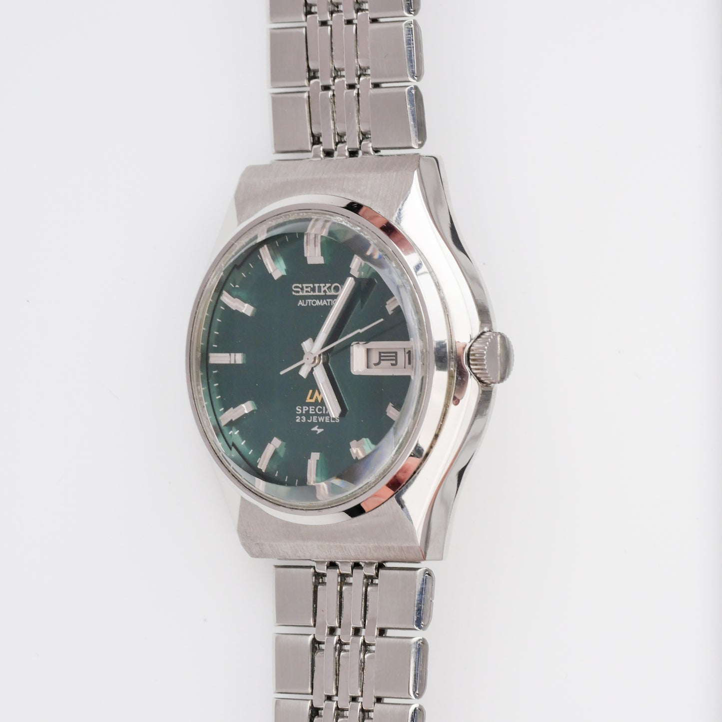 SEIKO LM SPECIAL DAY-DATE AUTOMATIC FACETED CRYSTAL GREEN DIAL REF. 5216-7040