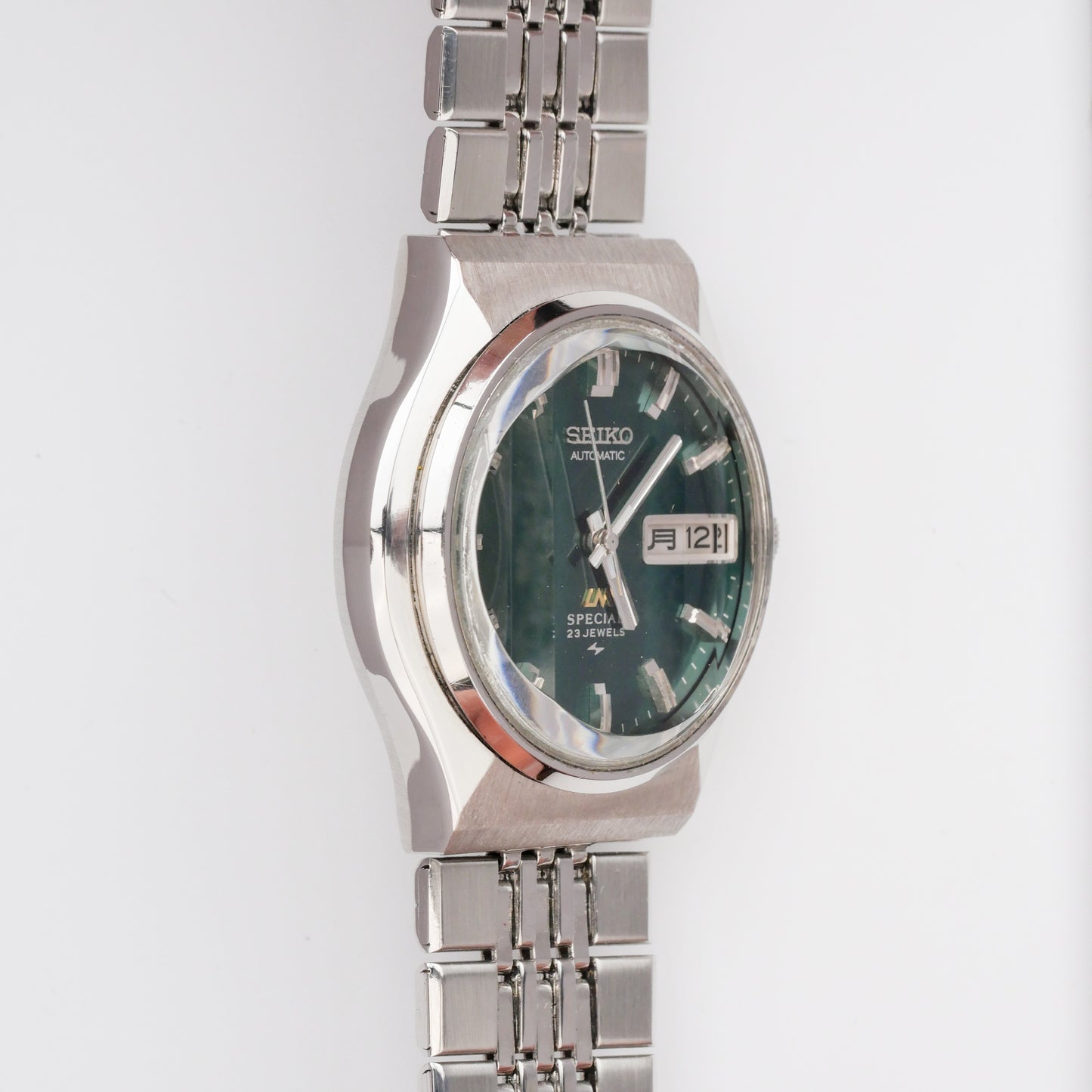 SEIKO LM SPECIAL DAY-DATE AUTOMATIC FACETED CRYSTAL GREEN DIAL REF. 5216-7040