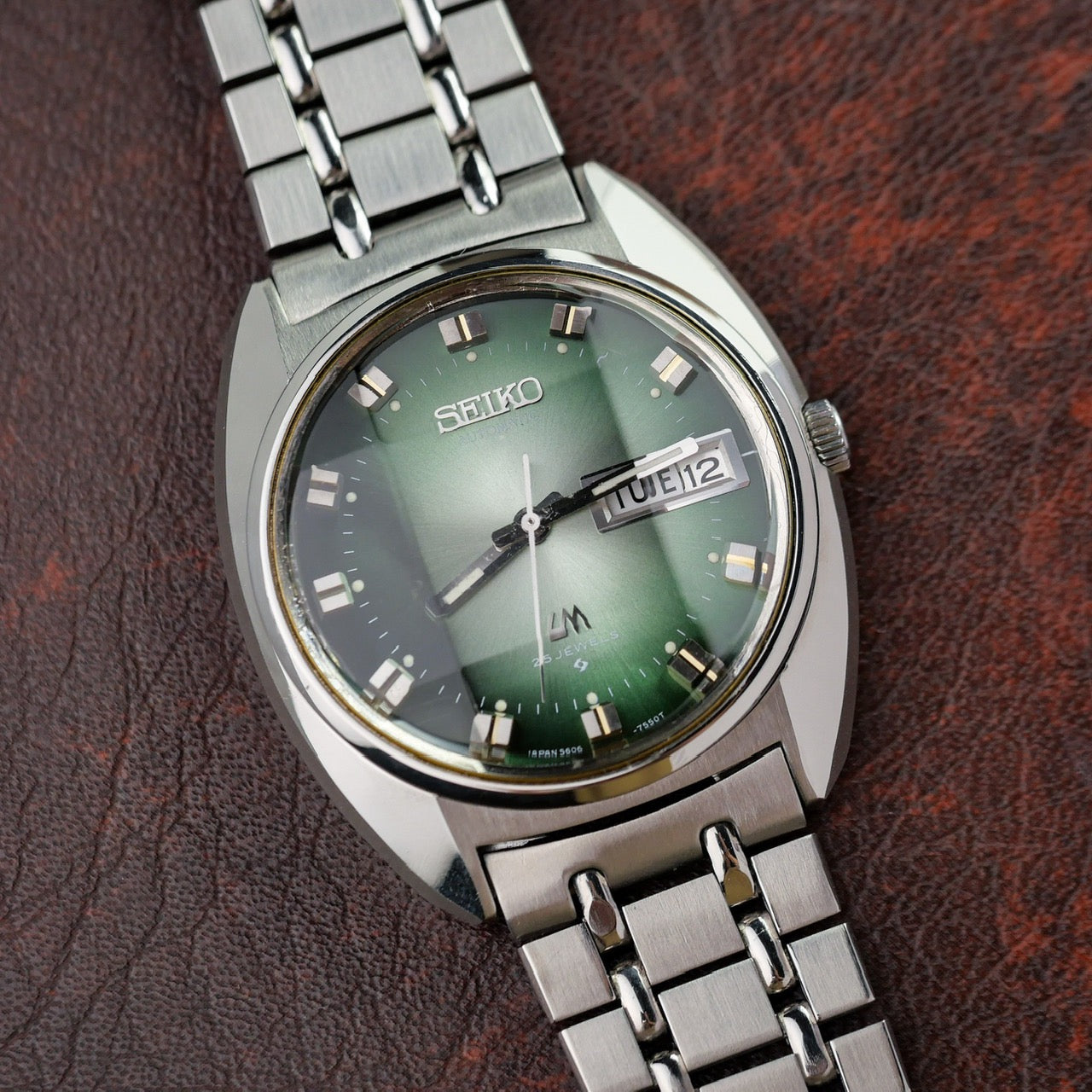 SEIKO LORD MATIC LM DAY-DATE FACETED CRYSTAL GREEN DIAL AUTOMATIC REF. 5606-7230