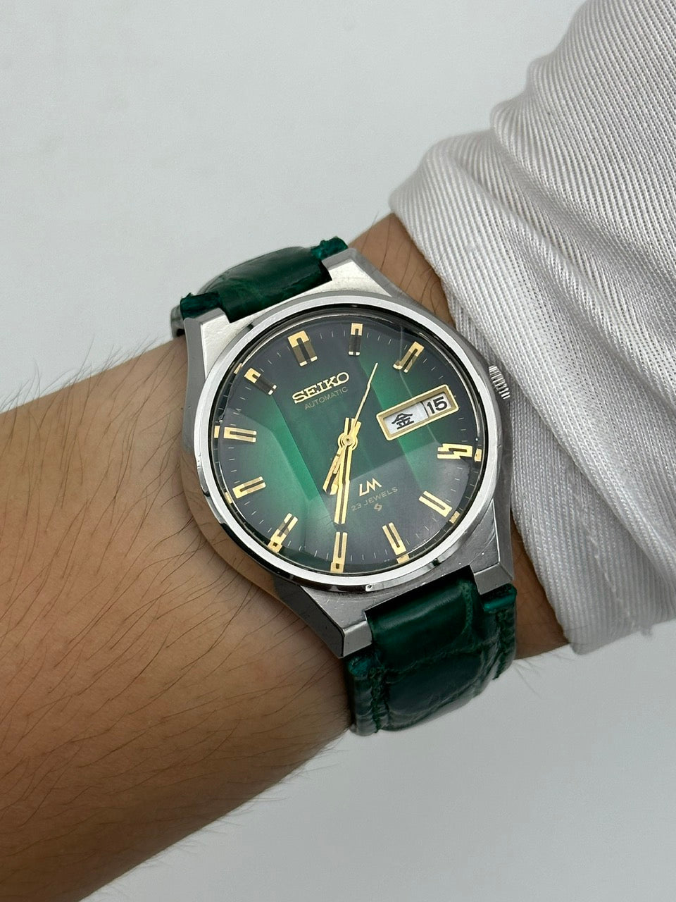 SEIKO LORD MATIC LM DAY-DATE FACETED CRYSTAL GREEN DIAL AUTOMATIC REF. 5606-7350