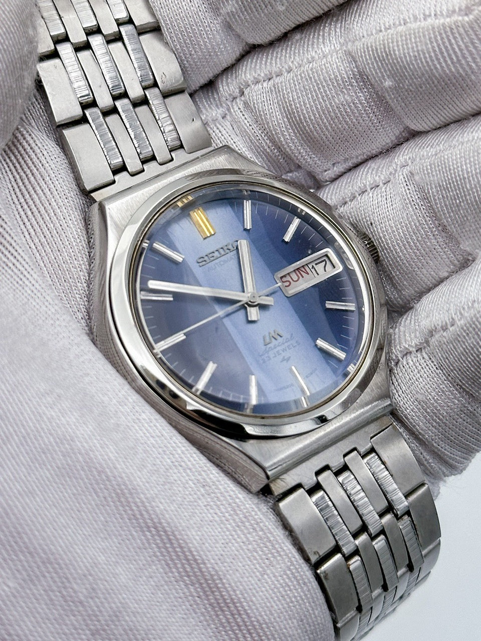 SEIKO LORD MATIC LM SPECIAL AUTOMATIC DAY-DATE FACETED CRYSTAL BLUE DIAL REF. 5206-6090