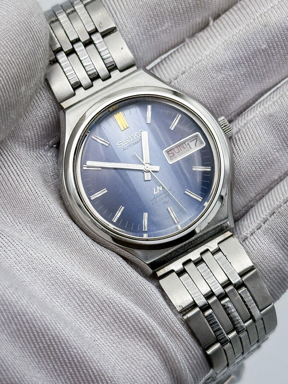 SEIKO LORD MATIC LM SPECIAL AUTOMATIC DAY-DATE FACETED CRYSTAL BLUE DIAL REF. 5206-6090