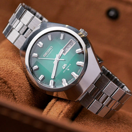 SEIKO LORD MATIC LM AUTOMATIC DAY-DATE FACETED CRYSTAL GREEN DIAL REF. 5606-7360