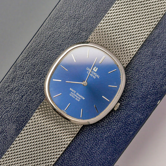 UNIVERSAL GENÈVE GILT SHADOW ULTR-SLIM AUTOMATIC BLUE DIAL REF. 866104