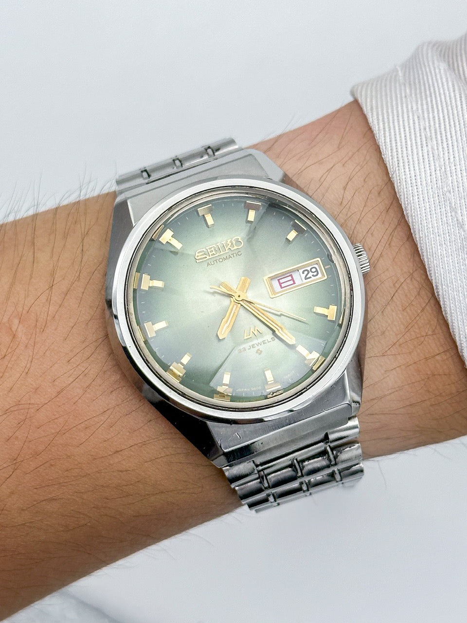 SEIKO LORD MATIC LM DAY-DATE FACETED CRYSTAL GREEN DIAL AUTOMATIC REF. 5606-7320