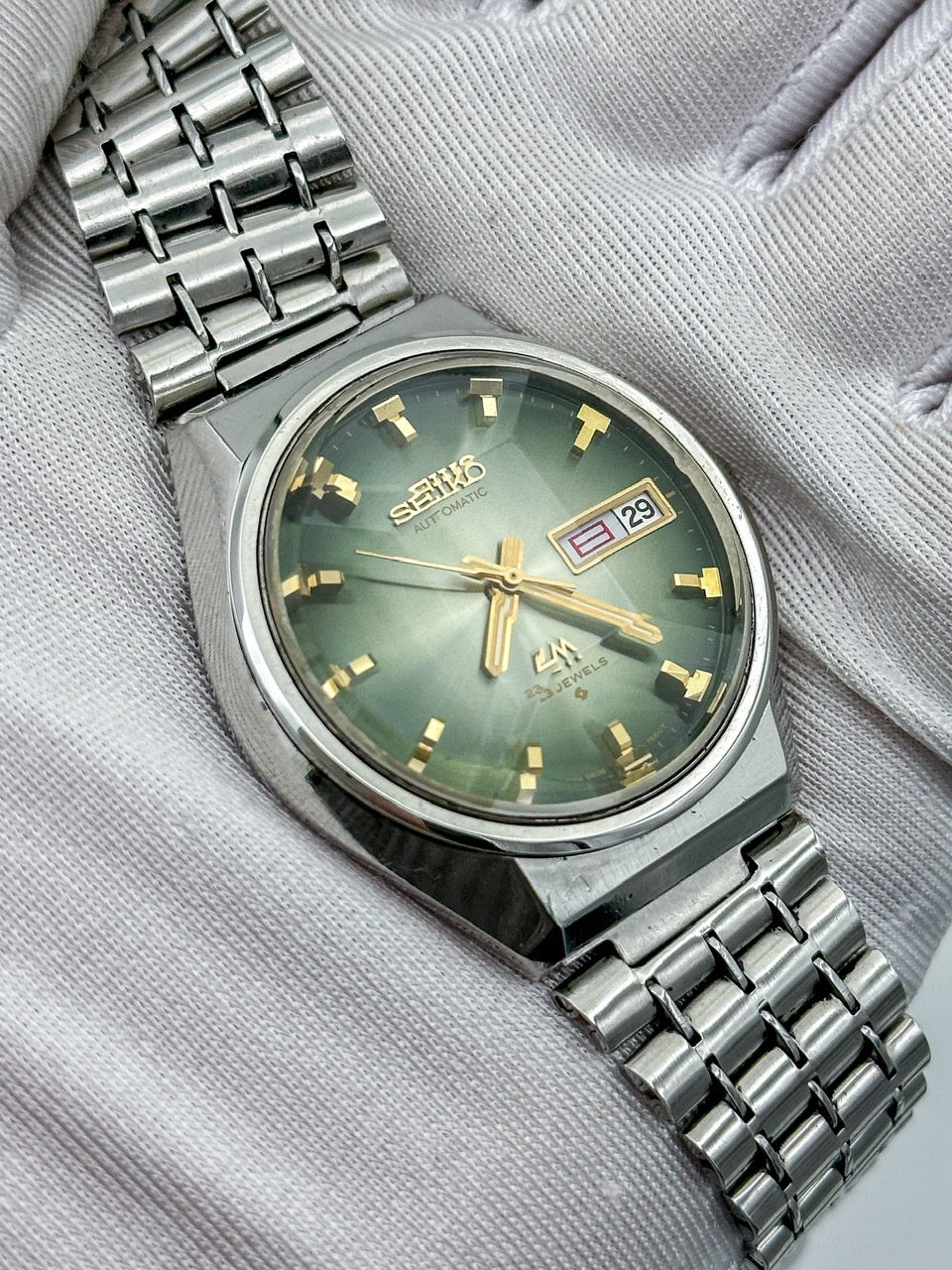 SEIKO LORD MATIC LM DAY-DATE FACETED CRYSTAL GREEN DIAL AUTOMATIC REF. 5606-7320