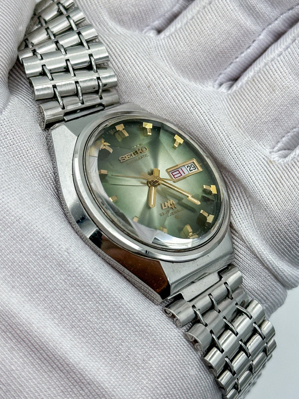 SEIKO LORD MATIC LM DAY-DATE FACETED CRYSTAL GREEN DIAL AUTOMATIC REF. 5606-7320