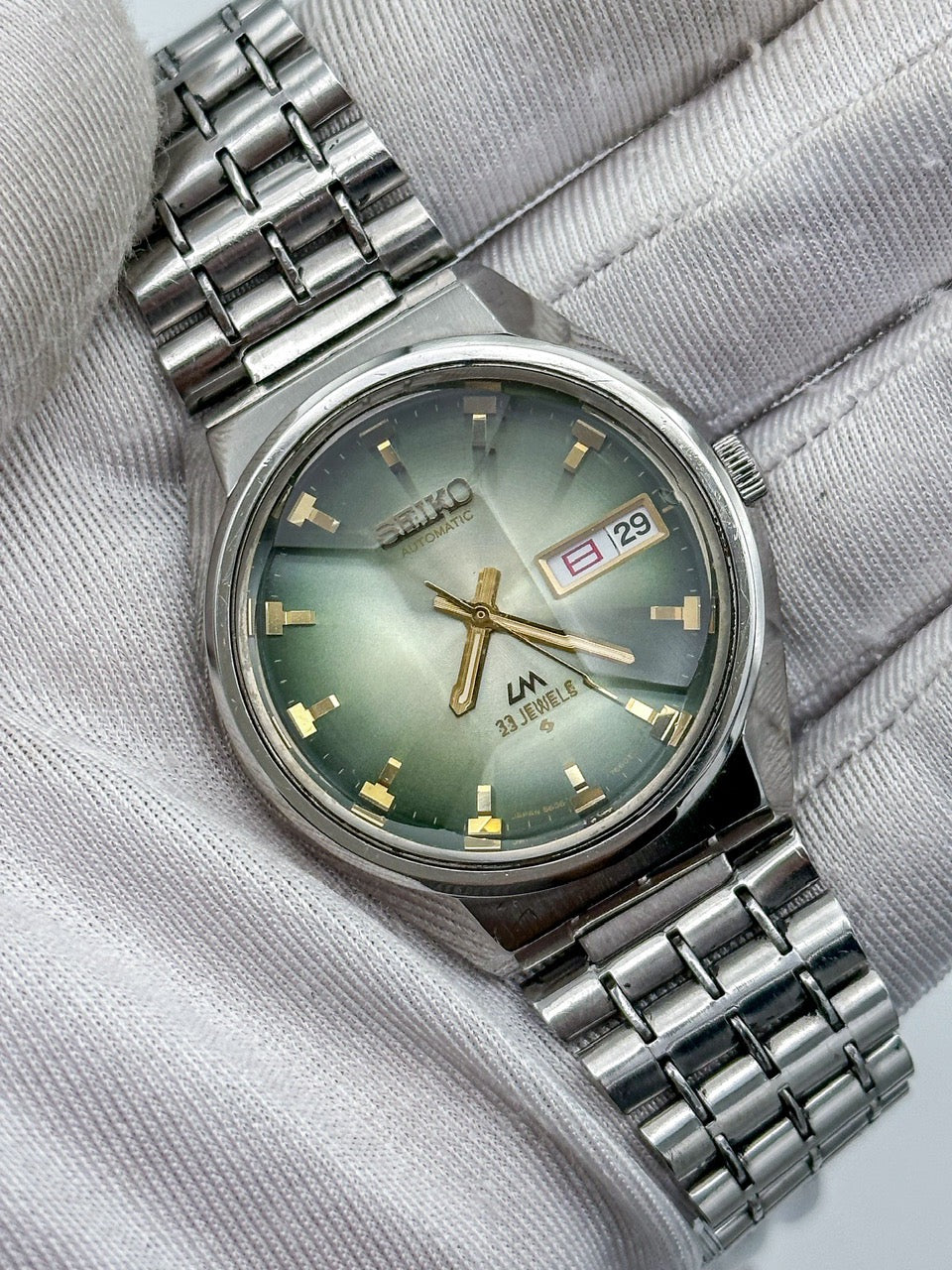 SEIKO LORD MATIC LM DAY-DATE FACETED CRYSTAL GREEN DIAL AUTOMATIC REF. 5606-7320